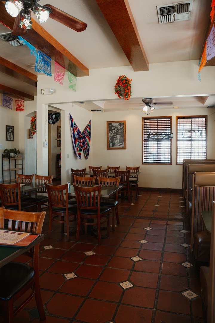 Colorful Mexican plates on a casual restaurant table.