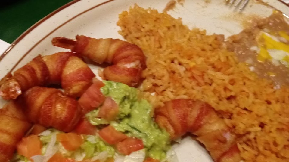 Breakfast menu with omelettes, skillets, and burritos.